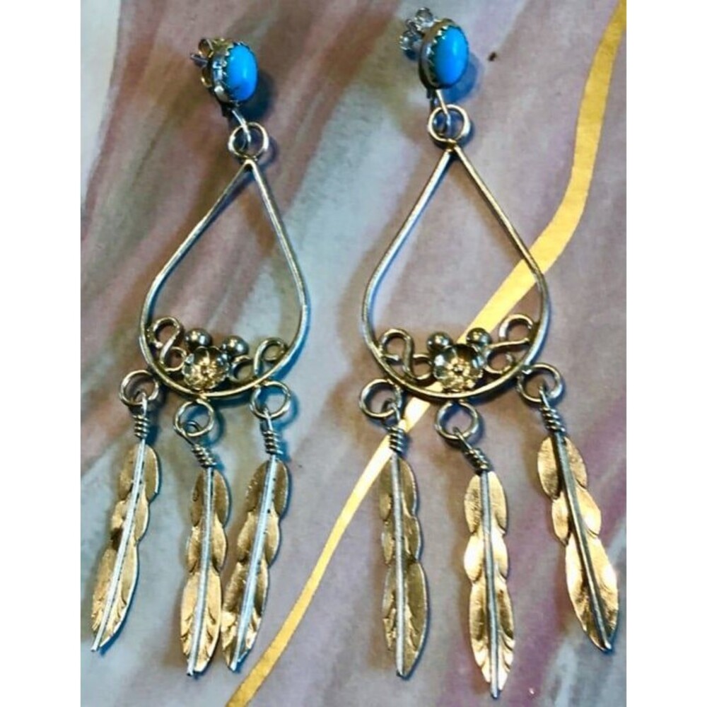 Sterling silver feather dangle earrings